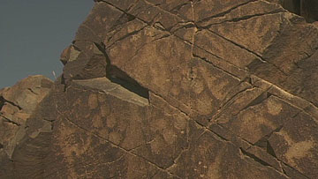 タムガルの考古的景観にある岩絵群